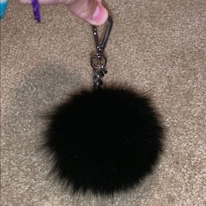 black furry michael kors ball